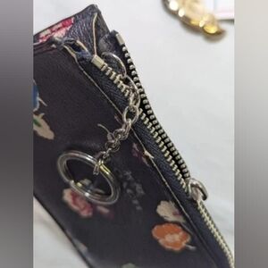 Damaged Floral Black Leather Wristlet Pouch with Silver Hardware Repair